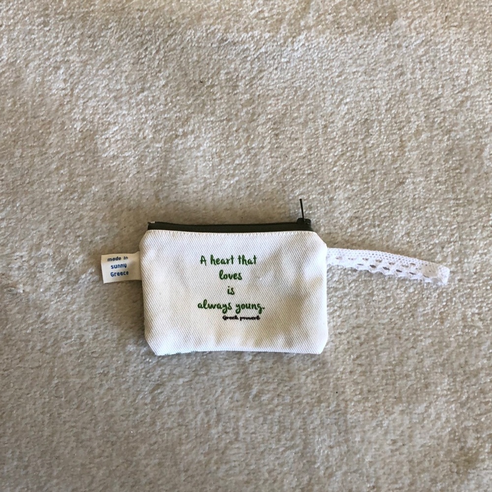 Small canvas pouch in cream with green details